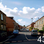 View of a residential street with cars parked outside houses